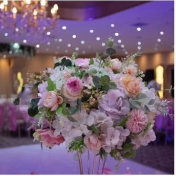 Tall pink and cream floral centrepiece at a Home Chef UK celebration
